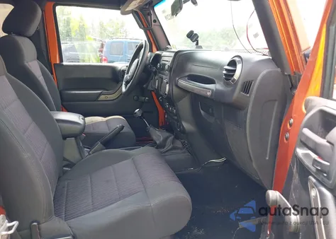 2011 Jeep Wrangler Sport z USA, uszkodzony, nr VIN 1J4AA2D12BL559626